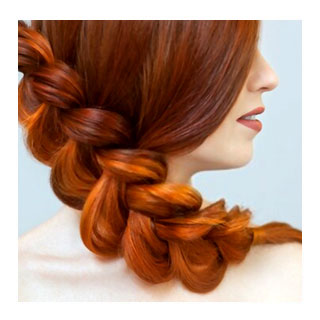 Copper hair in a loose side braid
