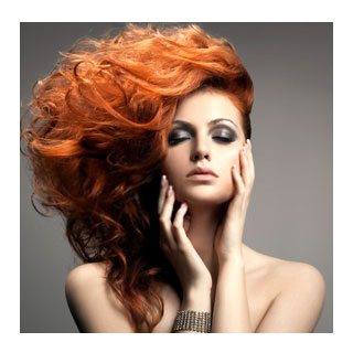 Woman with voluminous copper hair