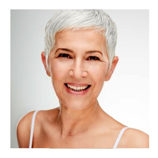 Smiling woman with short grey hair
