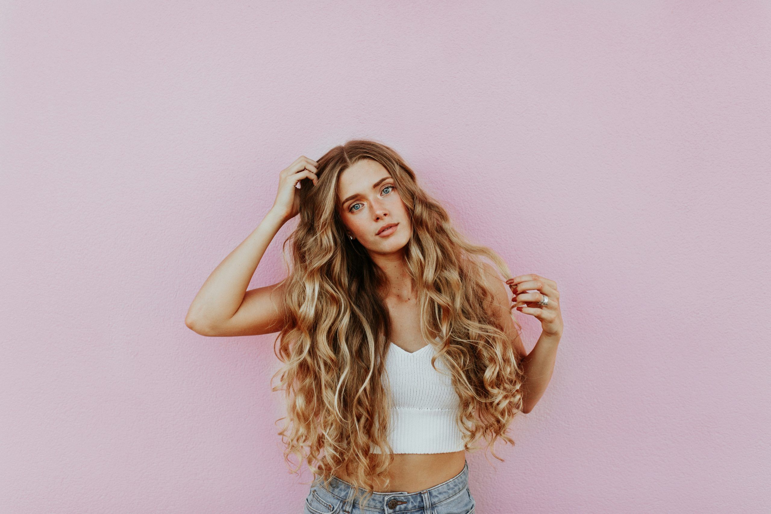 Woman with long healthy curly hair image